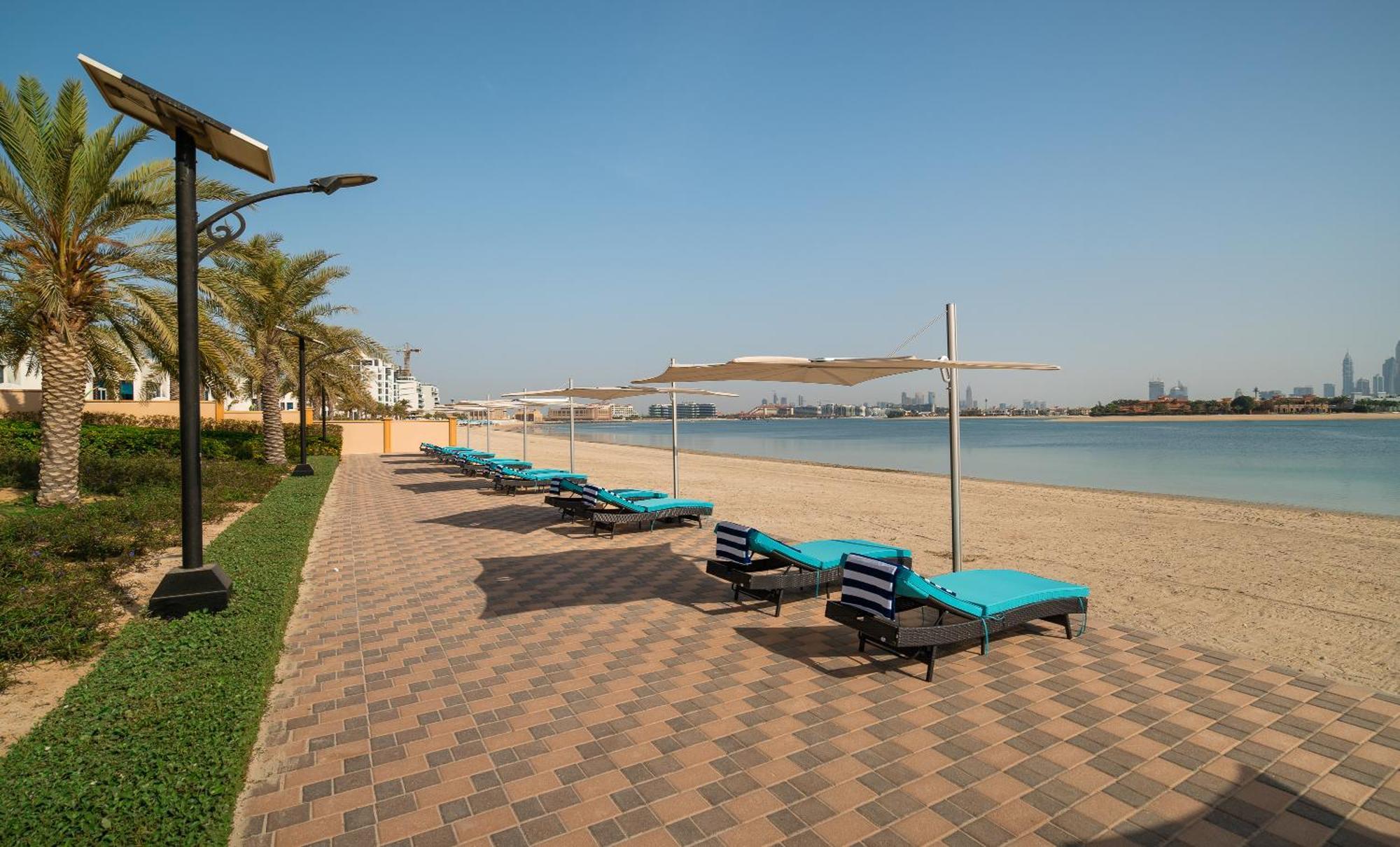 Apartamento Simply Comfort In Sarai Palm Jumeirah Dubái Exterior foto